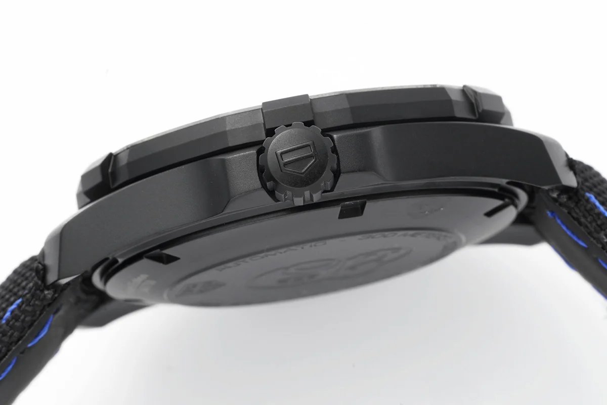 Aquaracer Calibre 5 Carbon Dial with Blue Tachymeter