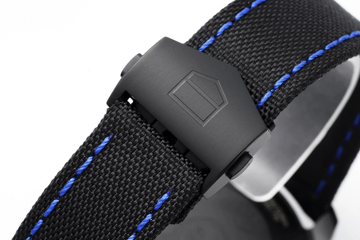 Aquaracer Calibre 5 Carbon Dial with Blue Tachymeter