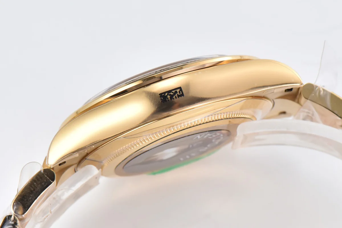 Daytona 116508 Black/Champagne Index “Newman” Dial in Yellow Gold