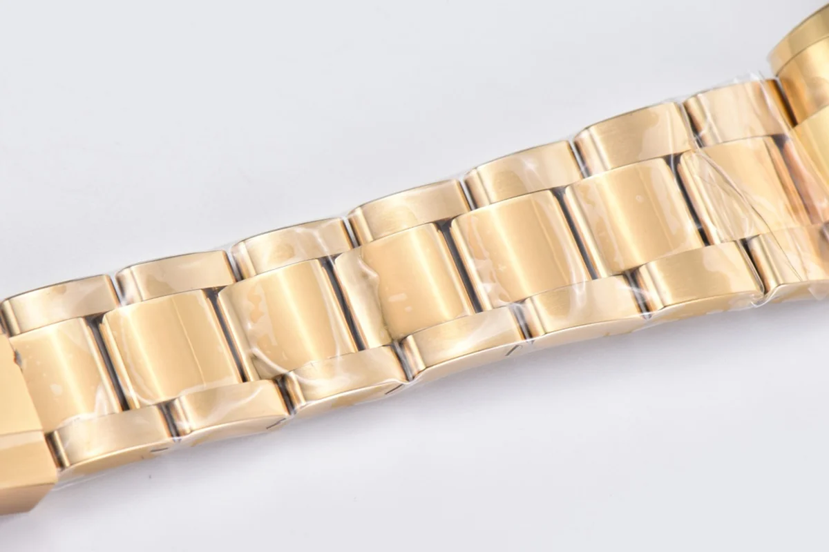 Daytona 116508 Black/Champagne Index “Newman” Dial in Yellow Gold