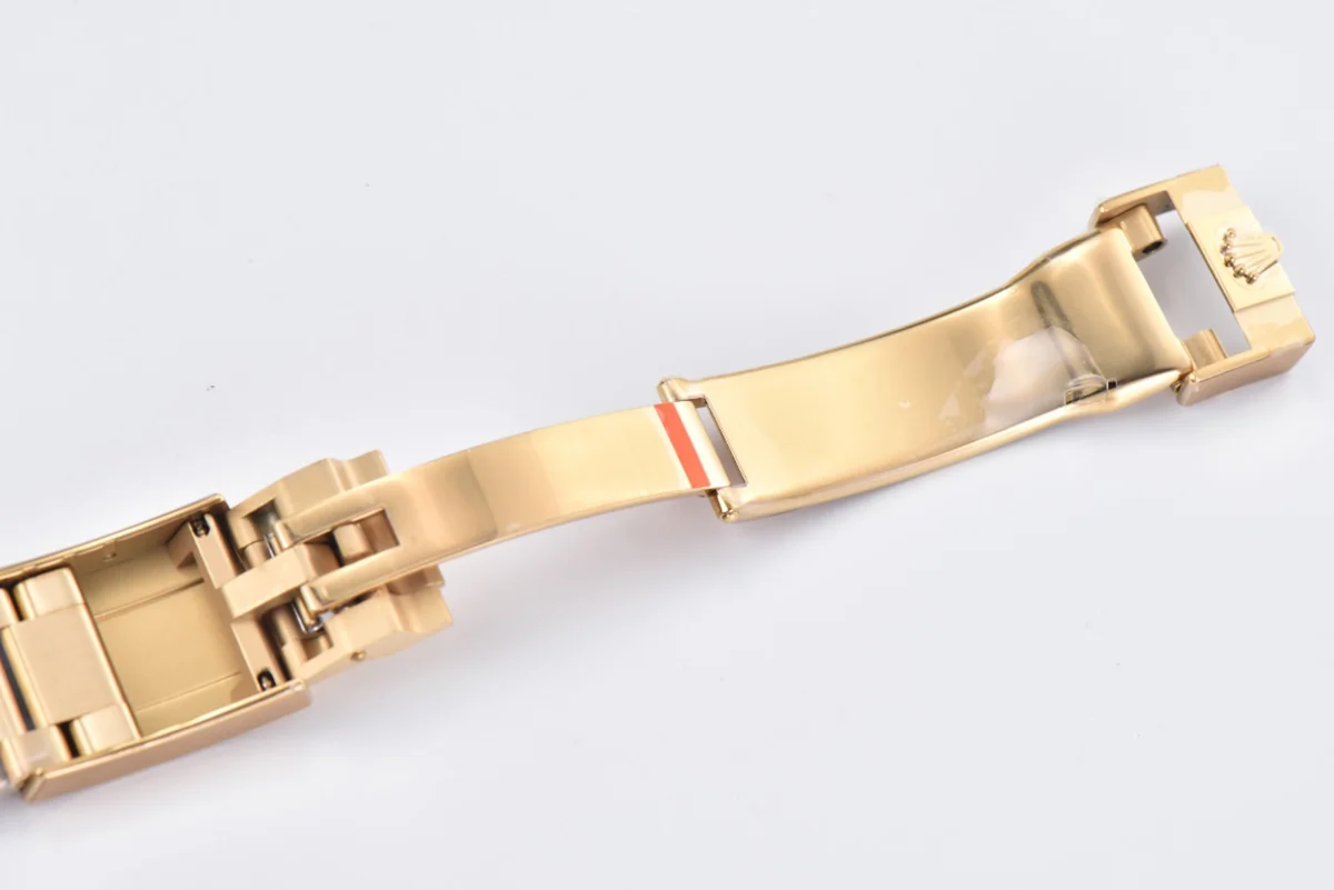 Daytona 116508 Black/Champagne Index “Newman” Dial in Yellow Gold