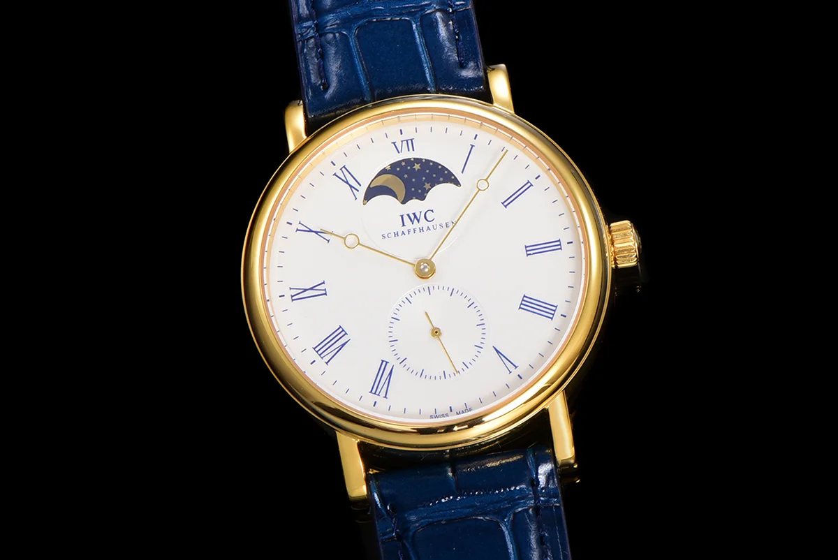 Portofino Hand Wound Moon Phrase IW5548 White Dial in Yellow Gold