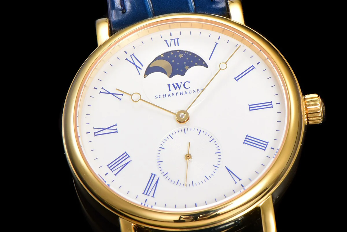 Portofino Hand Wound Moon Phrase IW5548 White Dial in Yellow Gold