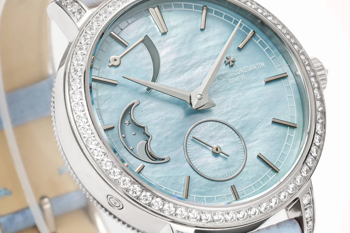 Traditionelle Moon Phase Blue MOP Dial with Diamond Bezel in White Gold on Blue Leather Strap
